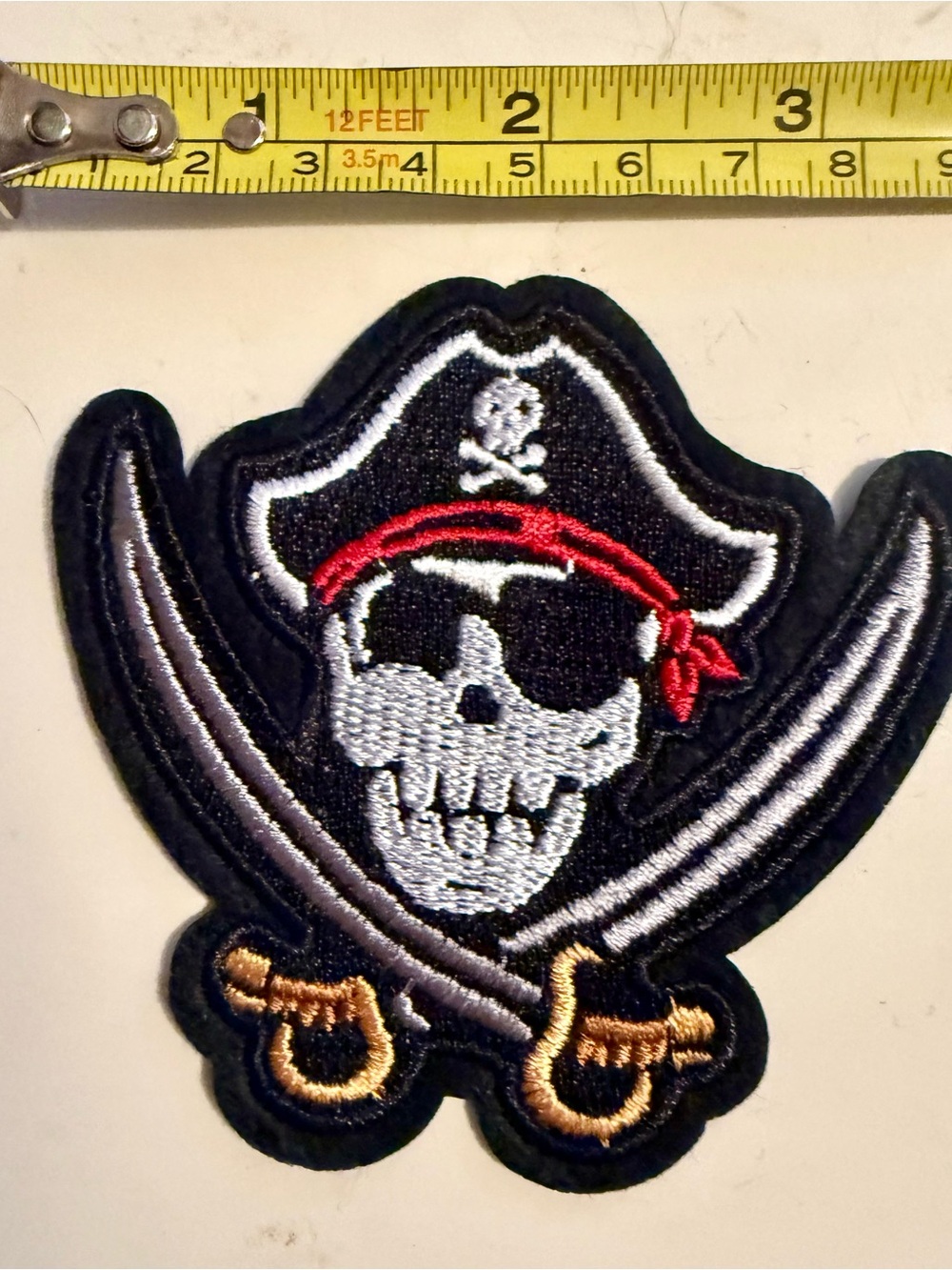 Pirate Skull & Crossed Swords Iron-On Patch - Black and Red